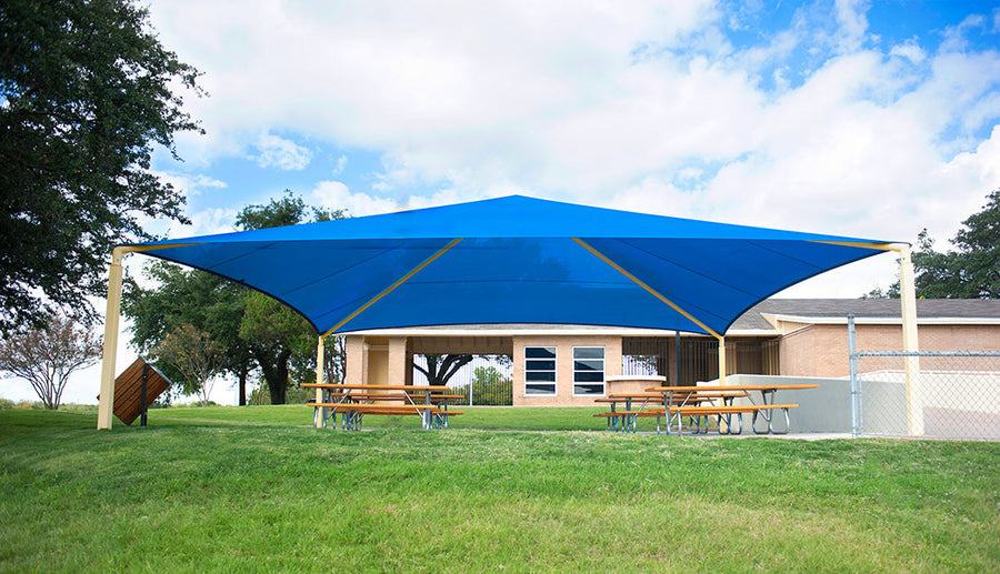 Pyramid shade structure over a playground